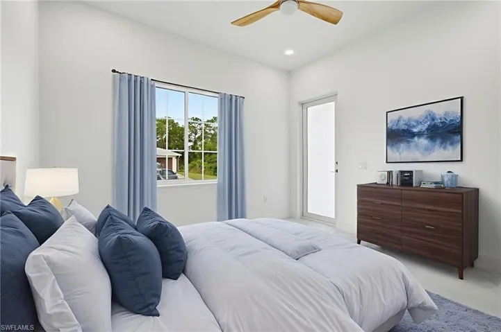 Bedroom featuring a ceiling fan and recessed lighting