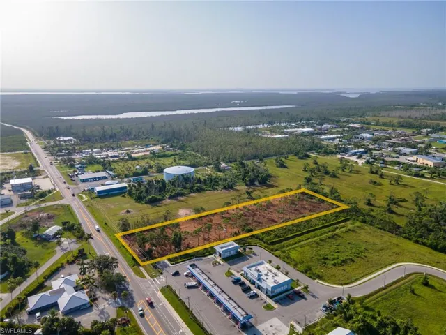Aerial overview of property's location featuring property boundaries highlighted