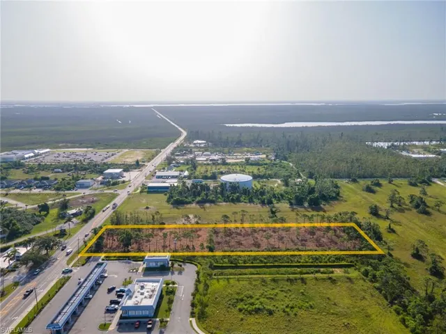 Aerial overview of property's location featuring property parcel outlined