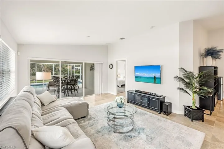 Warm and inviting Living Room with direct lanai access