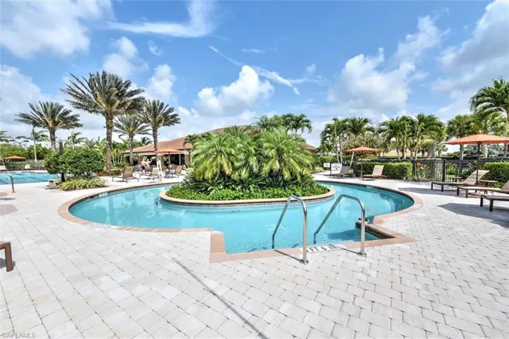 Community pool featuring a patio area