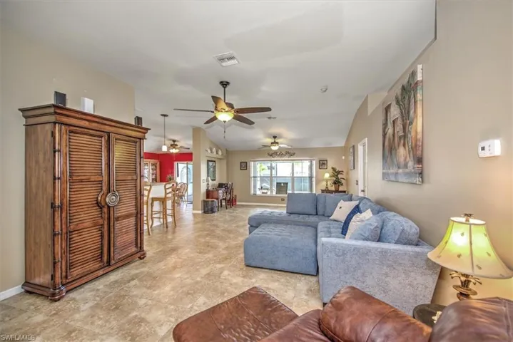 Living room with vaulted ceiling