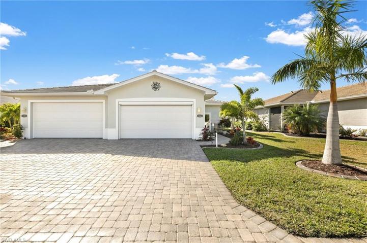 13441 Causeway Palms Cove is the 2 car garage on the right side