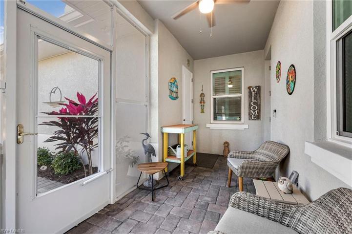 A massive 17' x 7' screened & covered lanai as you enter