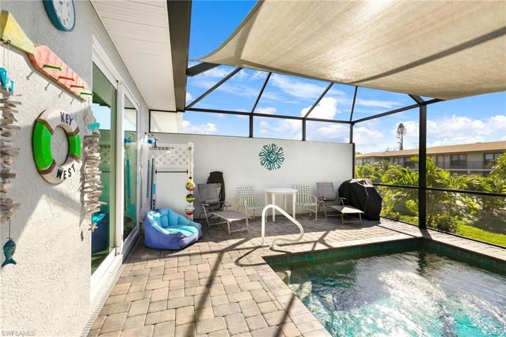 The heated saltwater pool is just steps from your master suite
