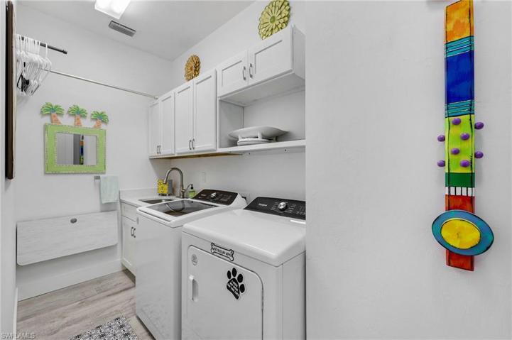 The laundry room with a sink is 11' x 4'
