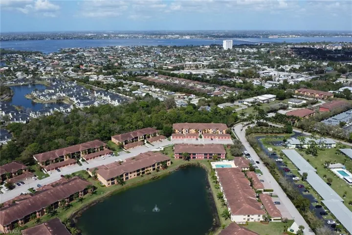 Aerial overview of property's location featuring a large body of water