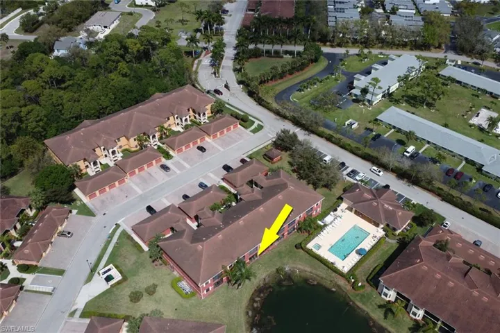 Aerial overview of property's location featuring nearby suburban area