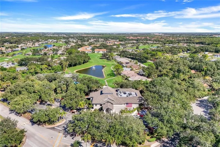 Bird's eye view of a nearby body of water and a golf club