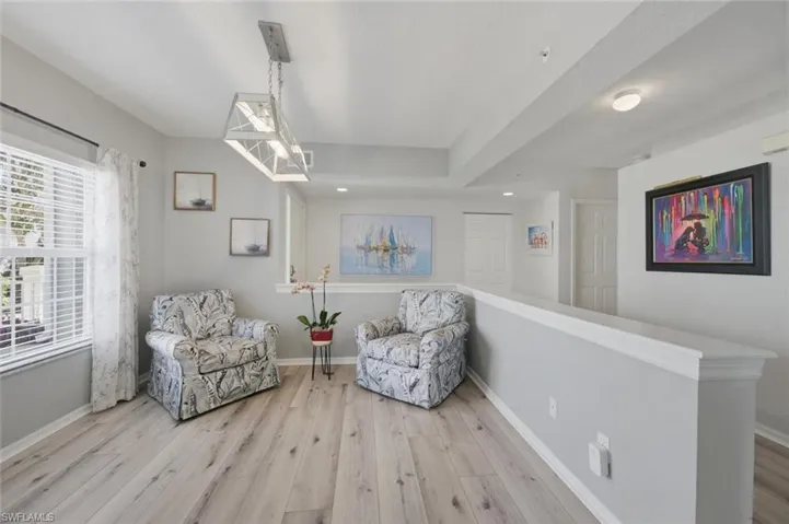 Sitting room featuring light wood finished floors