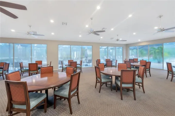 Dining space featuring carpet flooring and recessed lighting