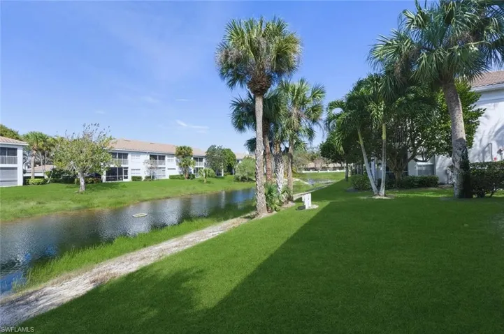 View of property's community featuring a water view
