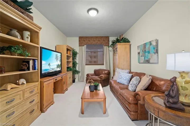 Living room with light colored carpet