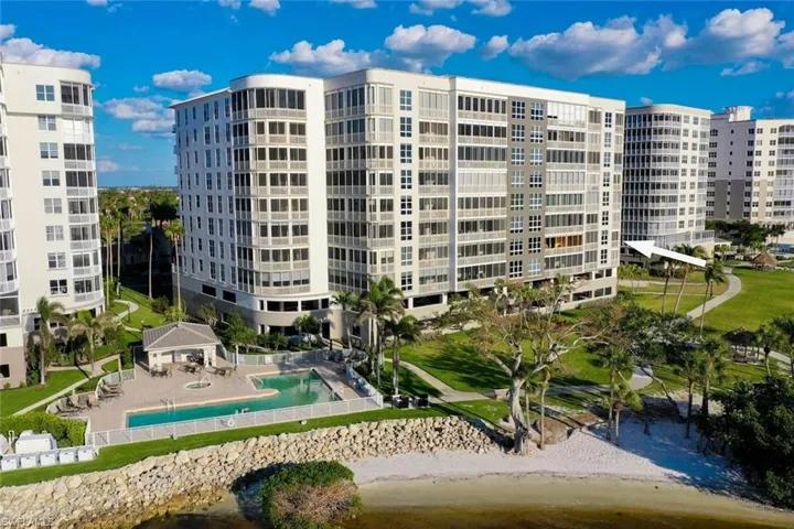 View of property featuring a community pool