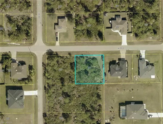 Aerial map of property and surrounding area featuring property parcel outlined