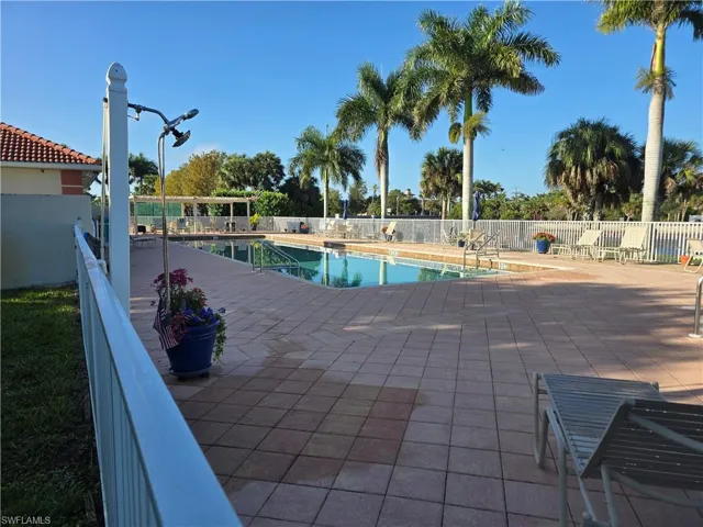 Community pool featuring a patio area
