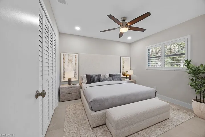Bedroom featuring a ceiling fan and recessed lighting