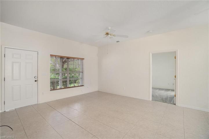Great room with entrance to primary bedroom