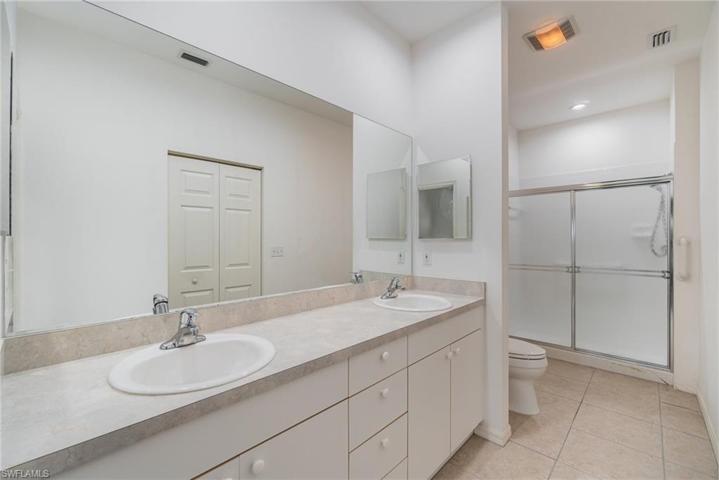 Primary bathroom with walk in closet