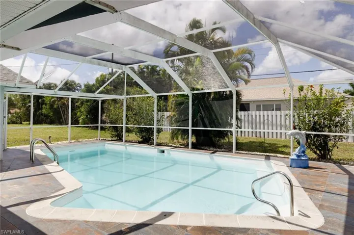 View of pool featuring a lanai and a patio