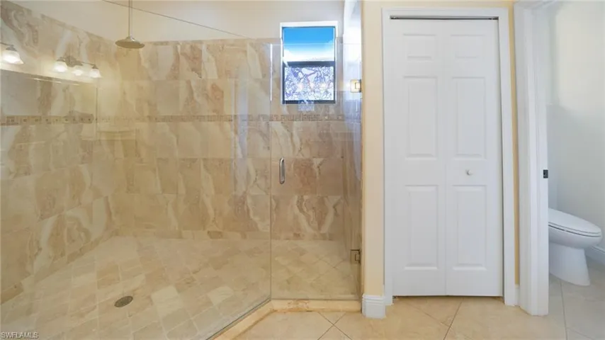 Shower and linen closet.
