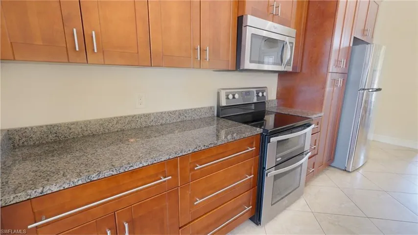 Miles of granite counters and double oven for easy cooking and entertaining.