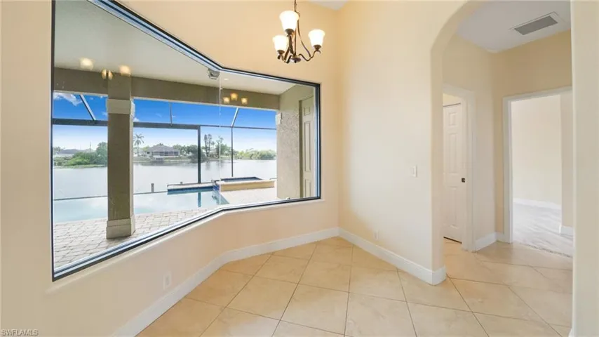 Great spot for that 1st cup of coffee overlooking the pool and lake.