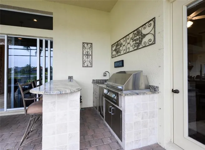 View of patio / terrace featuring grilling area and Bar Seating