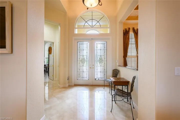 Foyer entrance featuring beautiful french doors