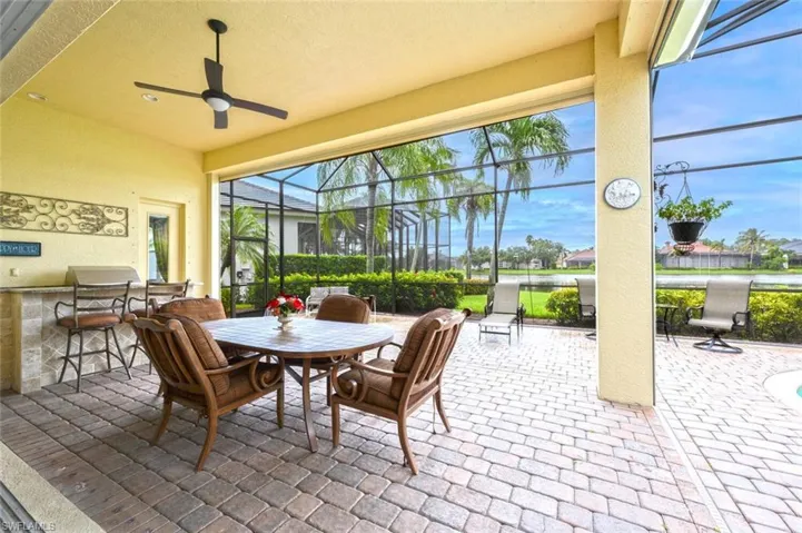 Great space for outdoor dining and relaxing pool and lake side