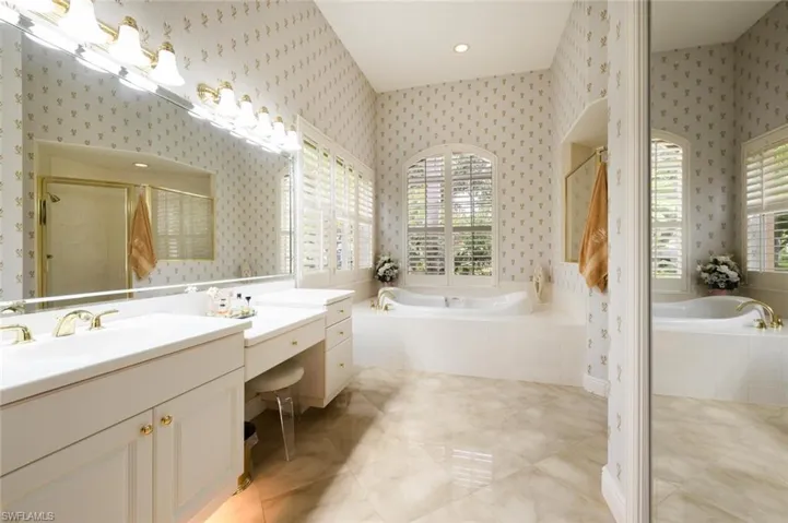 Primary Bedroom Ensuite with Walk in Organized Closet