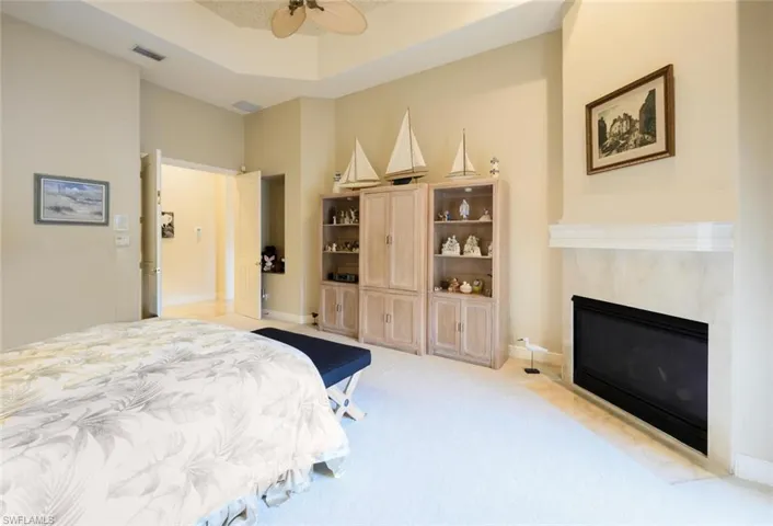 Primary carpeted Bedroom with 2 ensuites