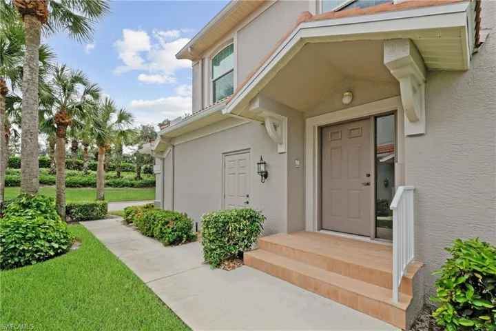 Property entrance featuring a yard