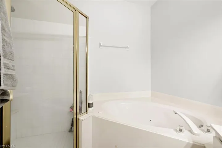 Bathroom with plus walk in shower