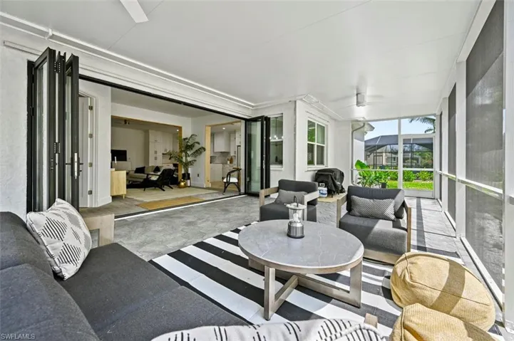 Sunroom with an outdoor hangout area