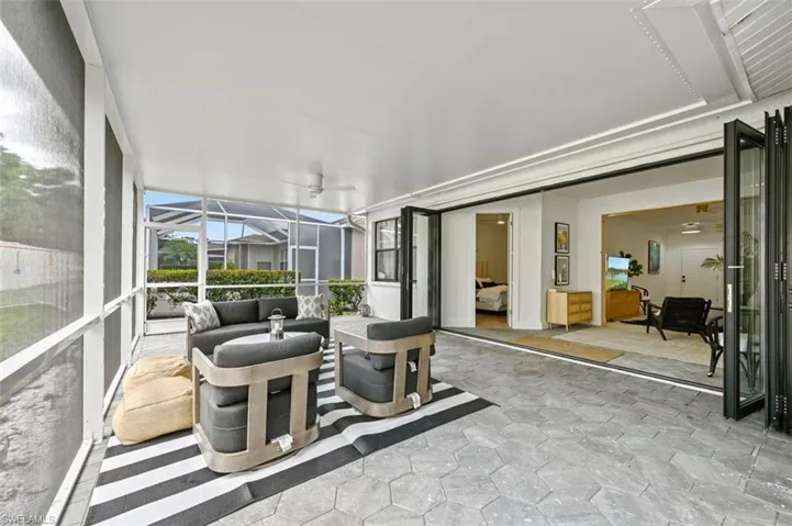 Sunroom with an outdoor hangout area