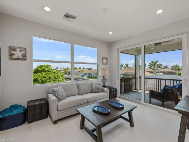 Living area featuring recessed lighting and a residential view