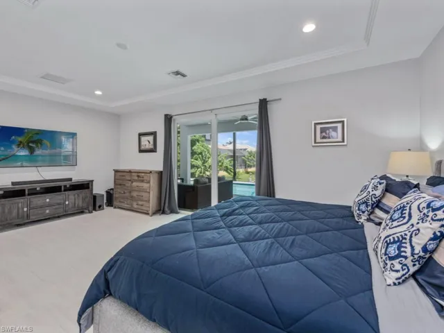 Bedroom featuring recessed lighting and access to outside