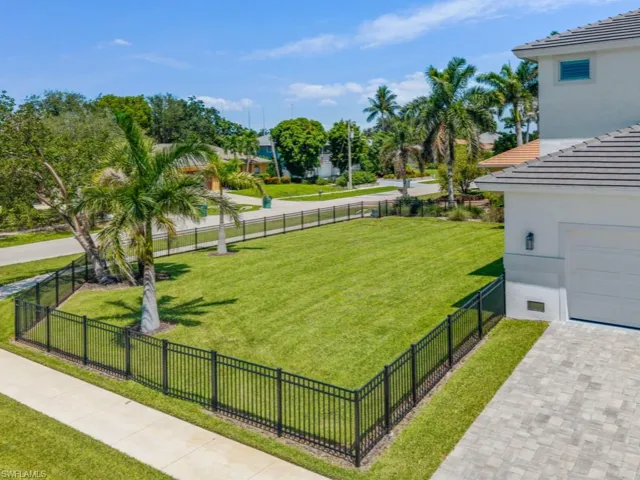 View of home's community featuring driveway and a garage