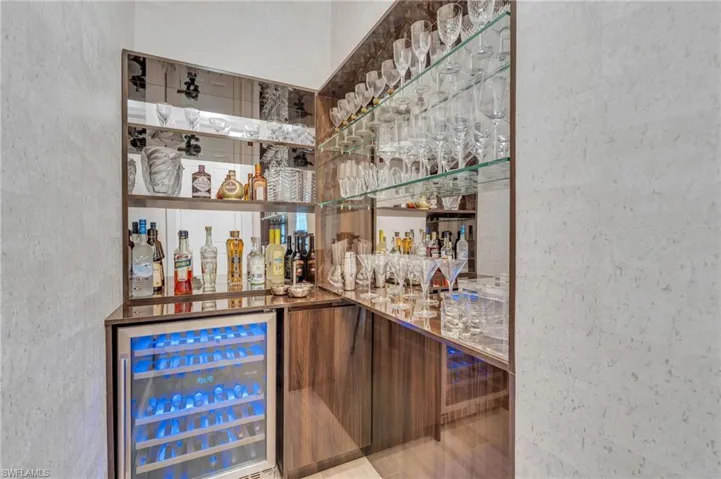 Bar featuring beverage cooler