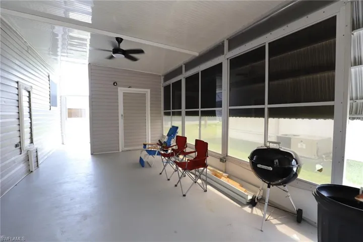 Sunroom with ceiling fan