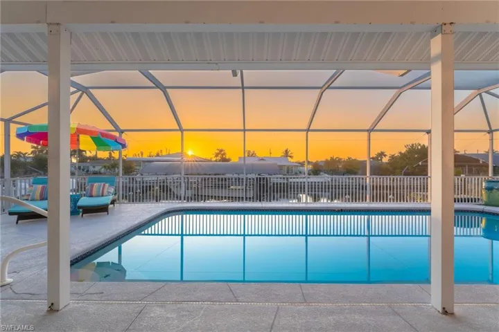 Swimming pool featuring  lanai and patio