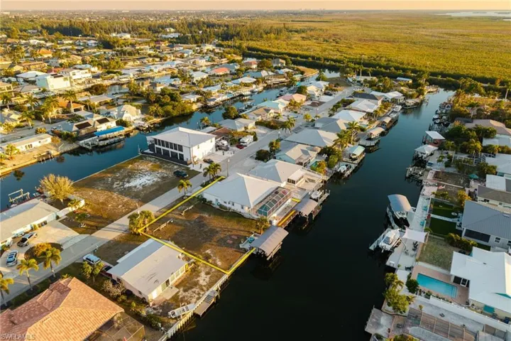 Aerial view of residential area with a large body of water