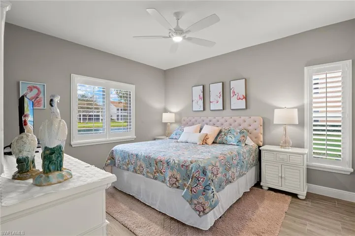 Bedroom featuring ceiling fan and light hardwood / wood-style floors