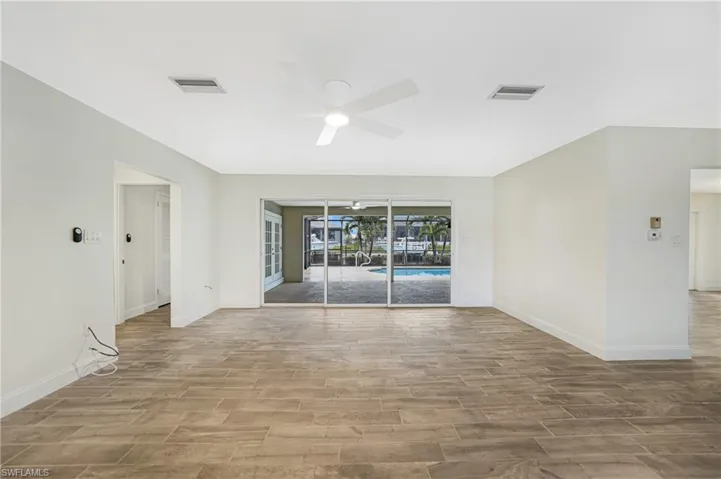 Empty room featuring ceiling fan