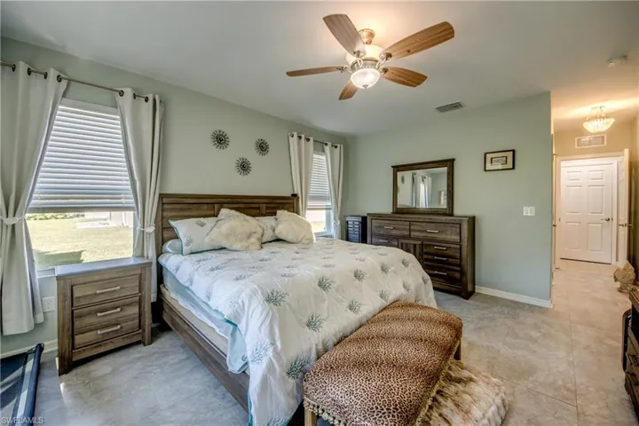 Ensuite Primary Bedroom W/Multiple Windows & Ceiling Fan