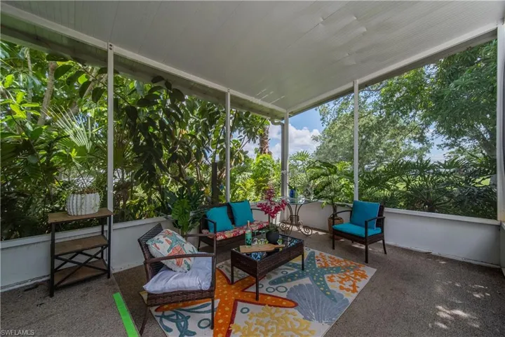 Sunroom / solarium with an outdoor living space