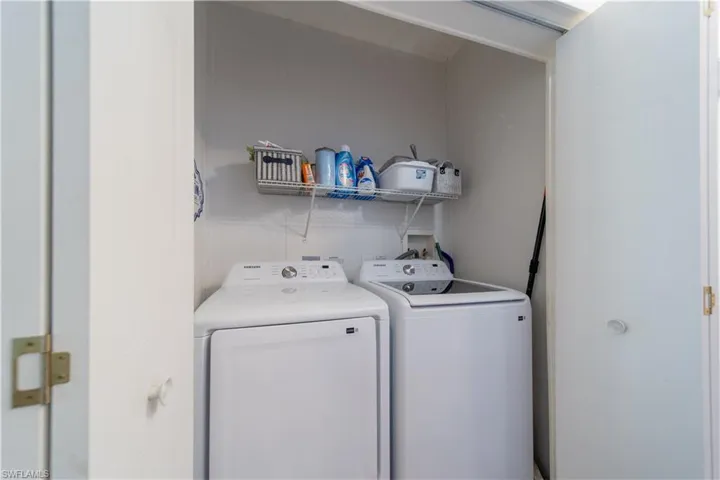 Laundry area featuring washer and clothes dryer
