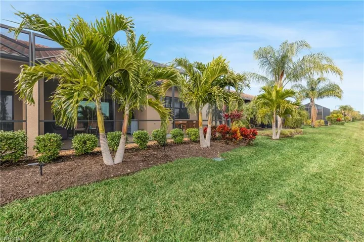 View of yard with a lanai