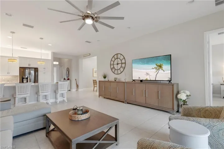 Tiled living room with ceiling fan